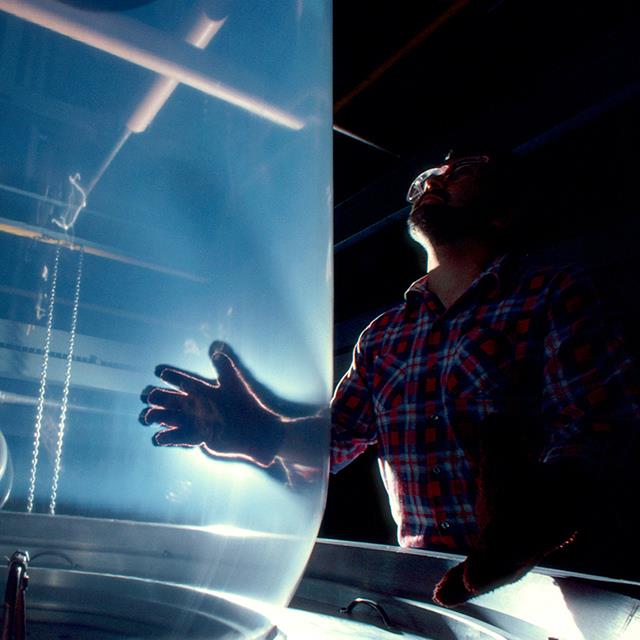 worker in a plastics manufacturing plant