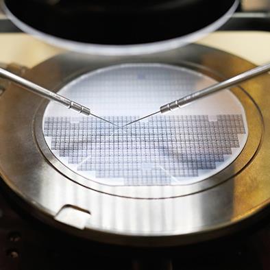 semiconductor silicon wafer undergoing probe testing